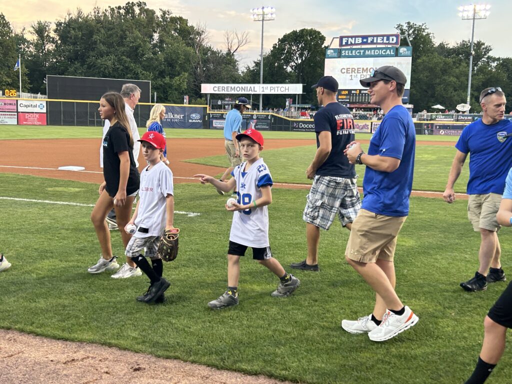 X and Z at Harrisburg Senators after taking the first pitch!